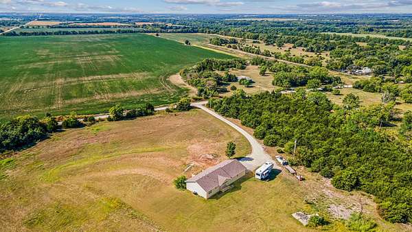 5.2 Acres of Land with Home for Auction in Douglass, Kansas