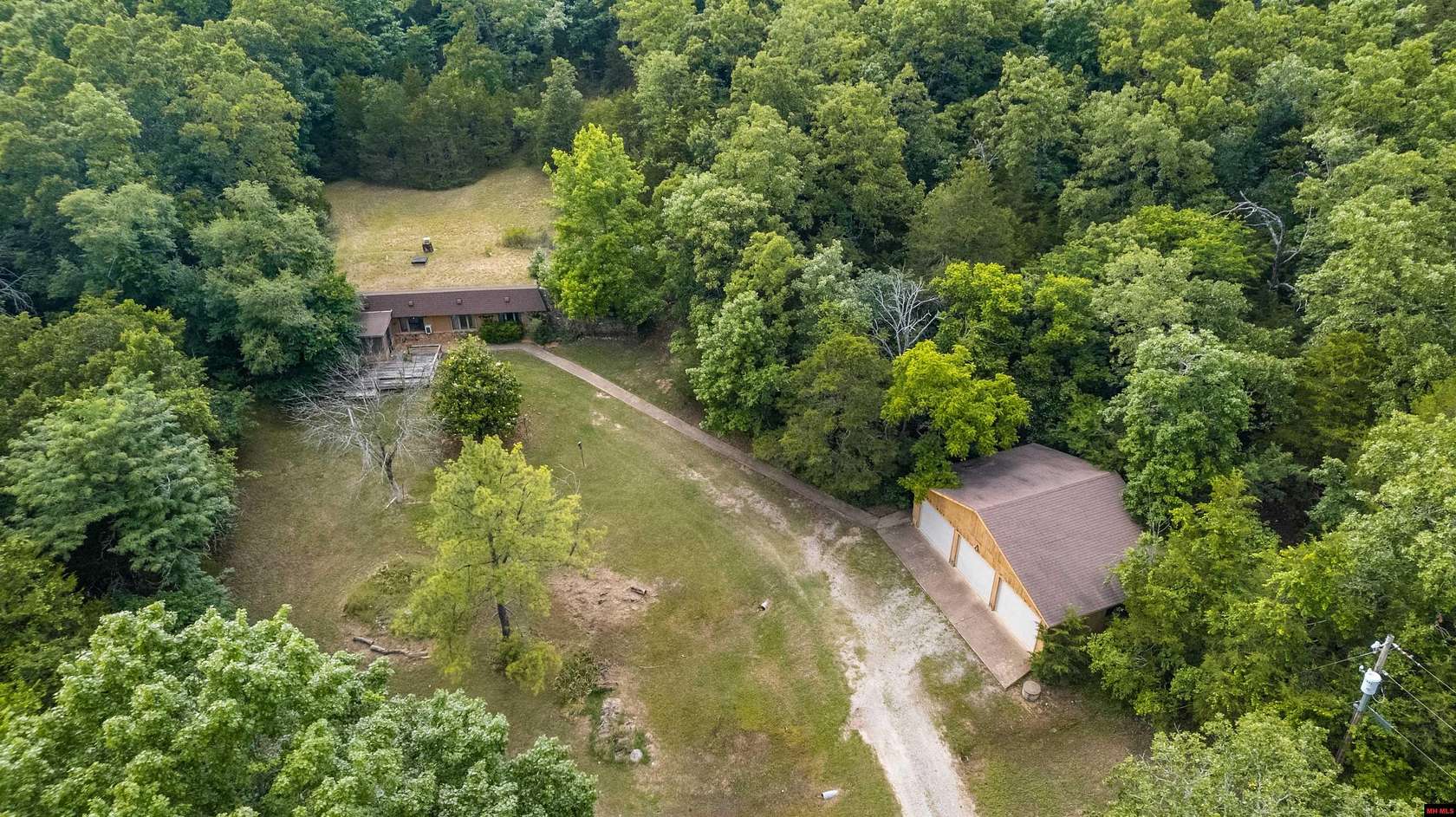 37.5 Acres of Land with Home for Sale in Oakland, Arkansas