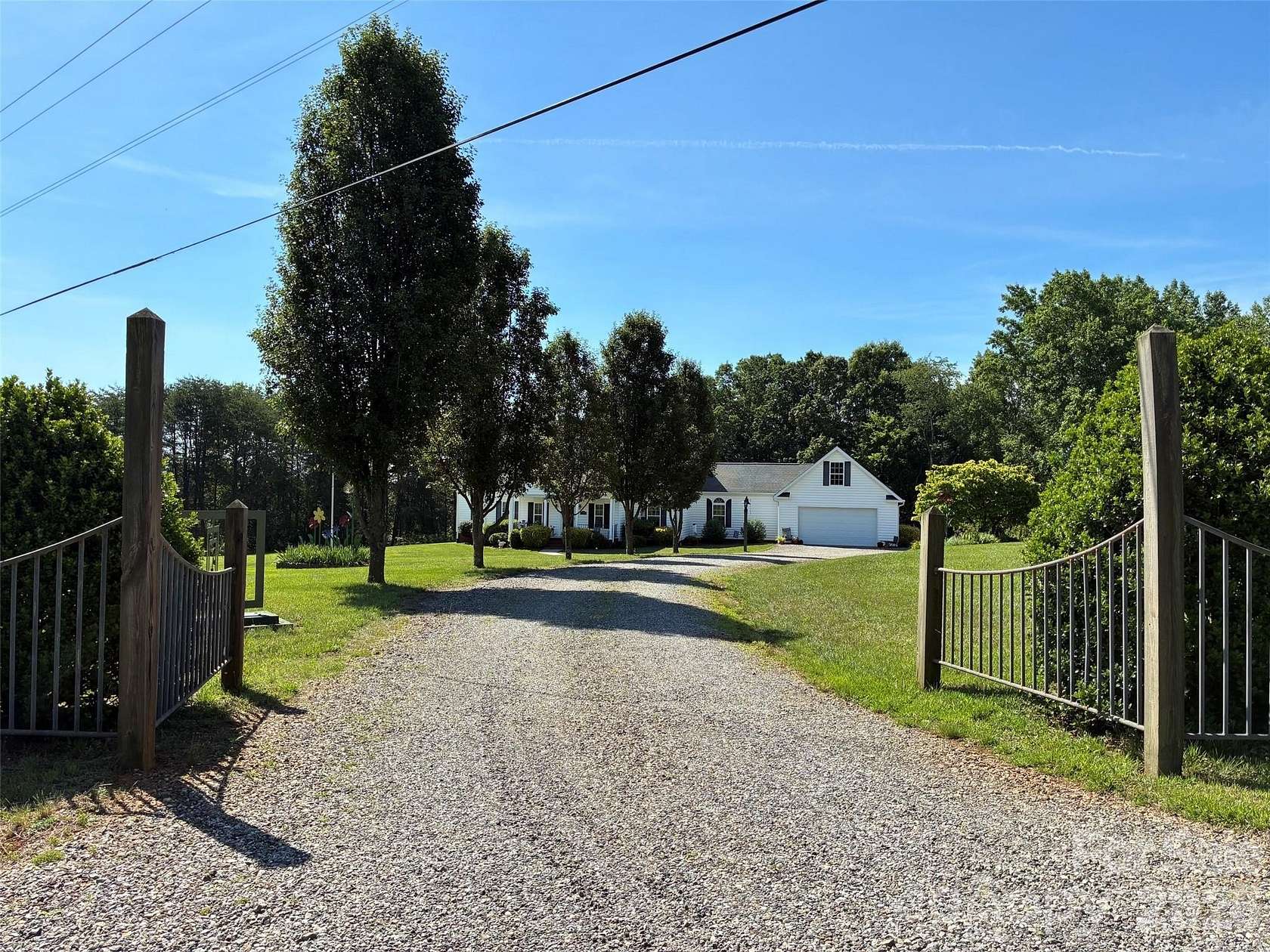 7 Acres of Land with Home for Sale in Hiddenite, North Carolina