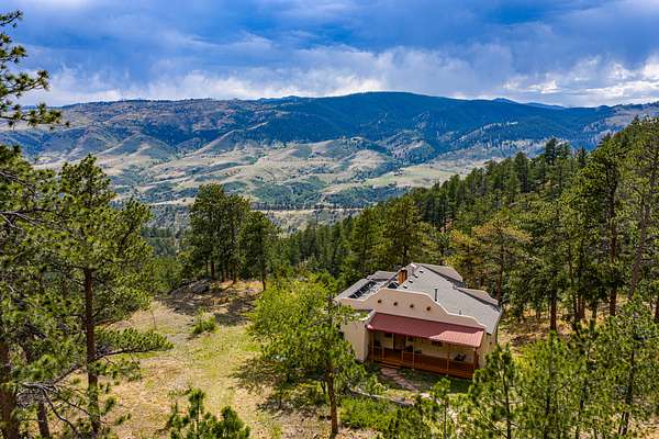 40 Acres of Land with Home for Sale in Loveland, Colorado