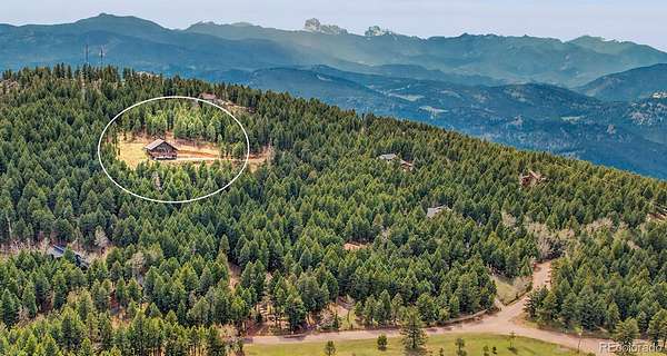 4.34 Acres of Land with Home for Sale in Evergreen, Colorado