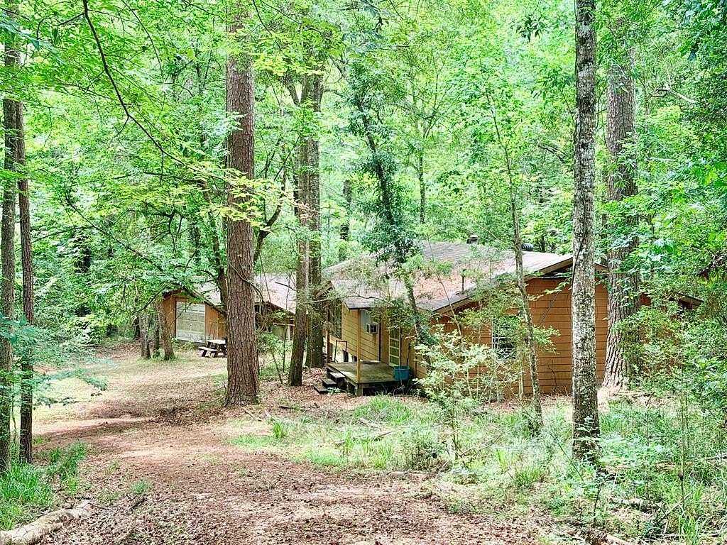 70.8 Acres of Recreational Land with Home for Sale in Woodville, Texas