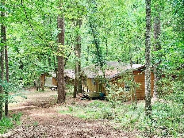 70.8 Acres of Recreational Land with Home for Sale in Woodville, Texas