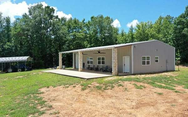 147 Acres of Land with Home for Sale in Lone Star, Texas