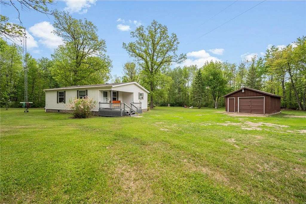 1.86 Acres of Land with Home for Sale in Blackberry Township, Minnesota