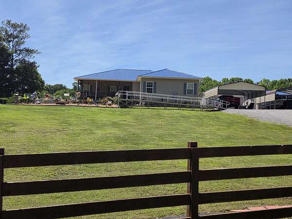 5.78 Acres of Land with Home for Sale in Athens, Tennessee