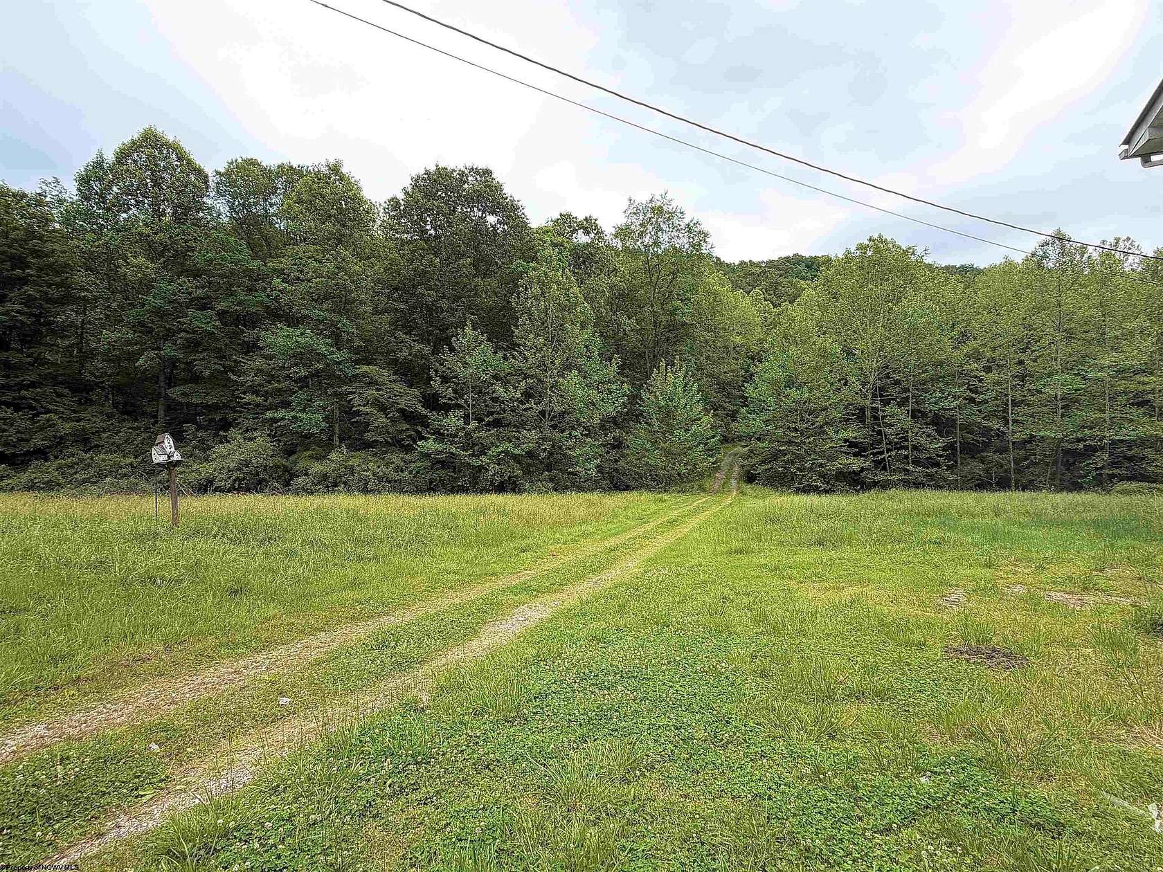 127 Acres of Land with Home for Sale in Glenville, West Virginia
