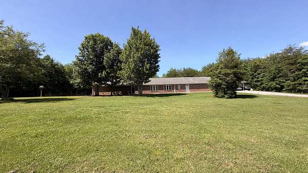 11 Acres of Land with Home for Sale in Graysville, Tennessee