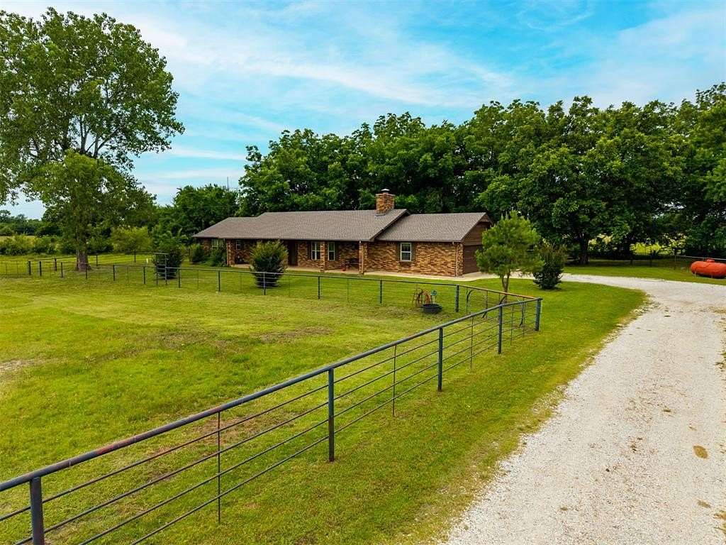 20 Acres of Agricultural Land with Home for Sale in Okemah, Oklahoma