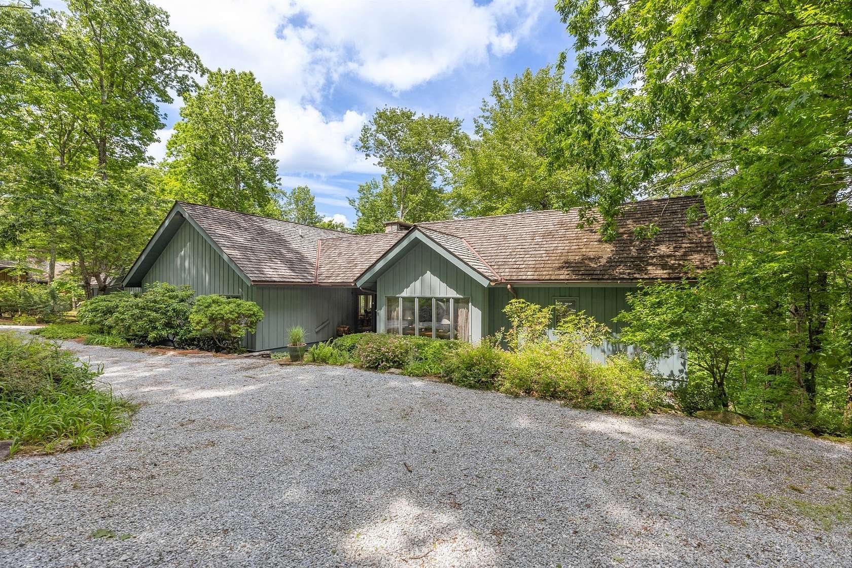 3.89 Acres of Land with Home for Sale in Cashiers, North Carolina