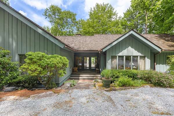 3.89 Acres of Land with Home for Sale in Cashiers, North Carolina