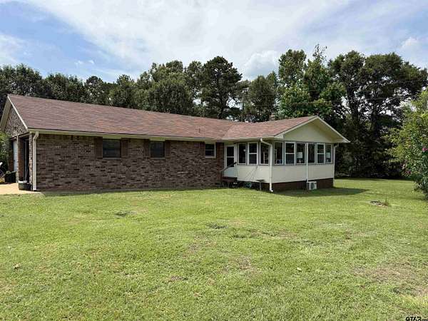 3.73 Acres of Land with Home for Sale in Jacksonville, Texas