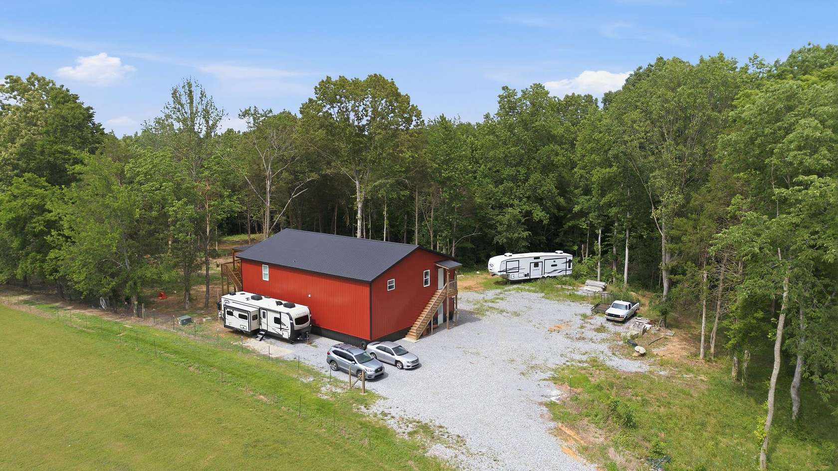 12.1 Acres of Land with Home for Sale in Chapmansboro, Tennessee