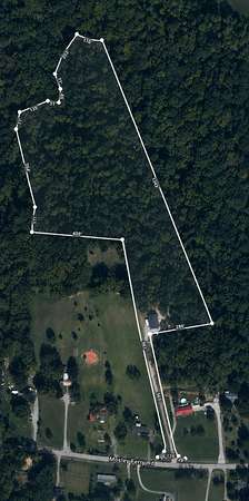 12.1 Acres of Land with Home for Sale in Chapmansboro, Tennessee