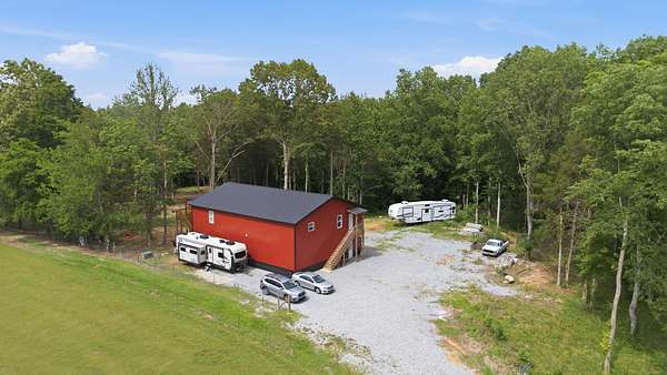 12.1 Acres of Land with Home for Sale in Chapmansboro, Tennessee