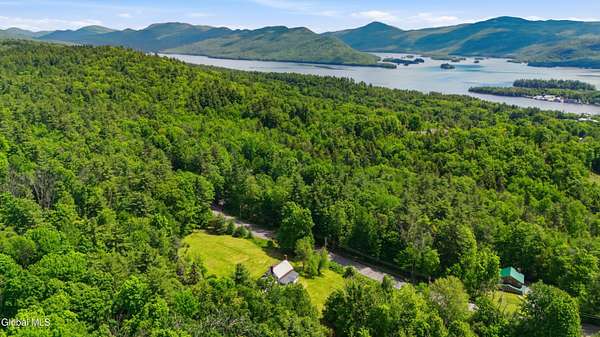 81.7 Acres of Recreational Land with Home for Sale in Bolton Landing, New York