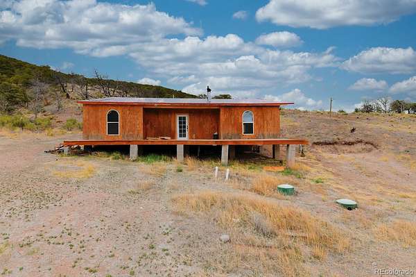 5.1 Acres of Land with Home for Sale in Fort Garland, Colorado