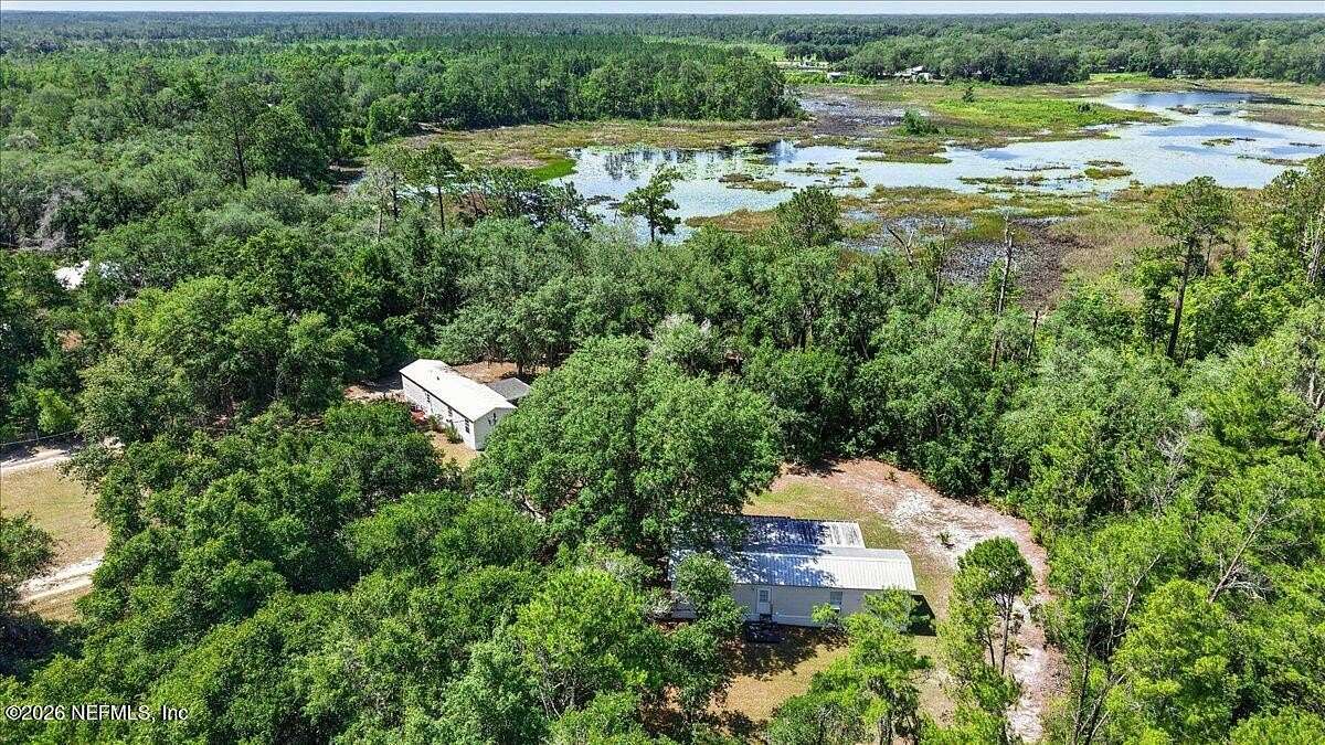2 Acres of Land with Home for Sale in Crescent City, Florida
