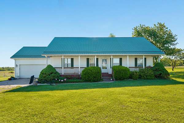 3.8 Acres of Land with Home for Sale in Seymour, Missouri