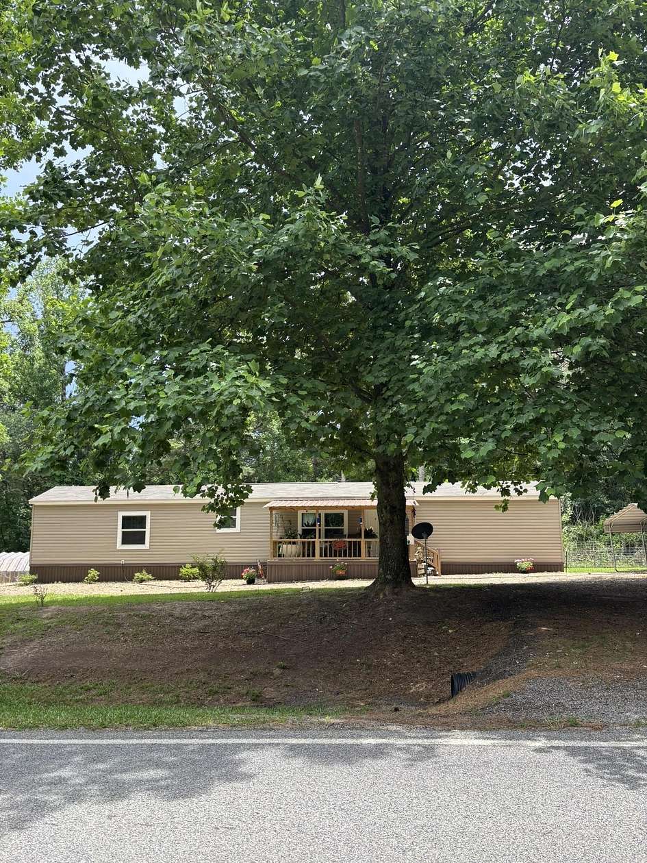 3.85 Acres of Land with Home for Sale in New Hope, Arkansas