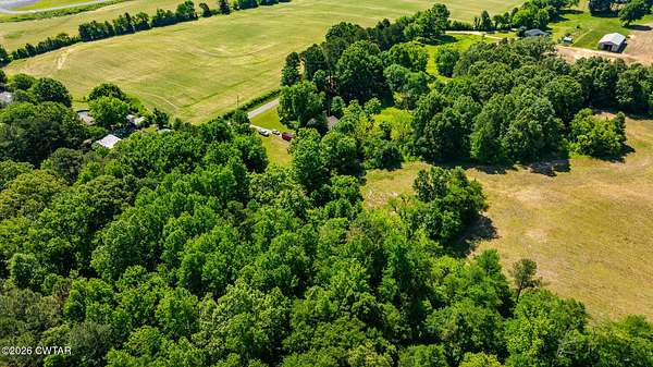 21 Acres of Land with Home for Auction in Milan, Tennessee