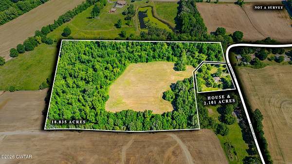 21 Acres of Land with Home for Auction in Milan, Tennessee