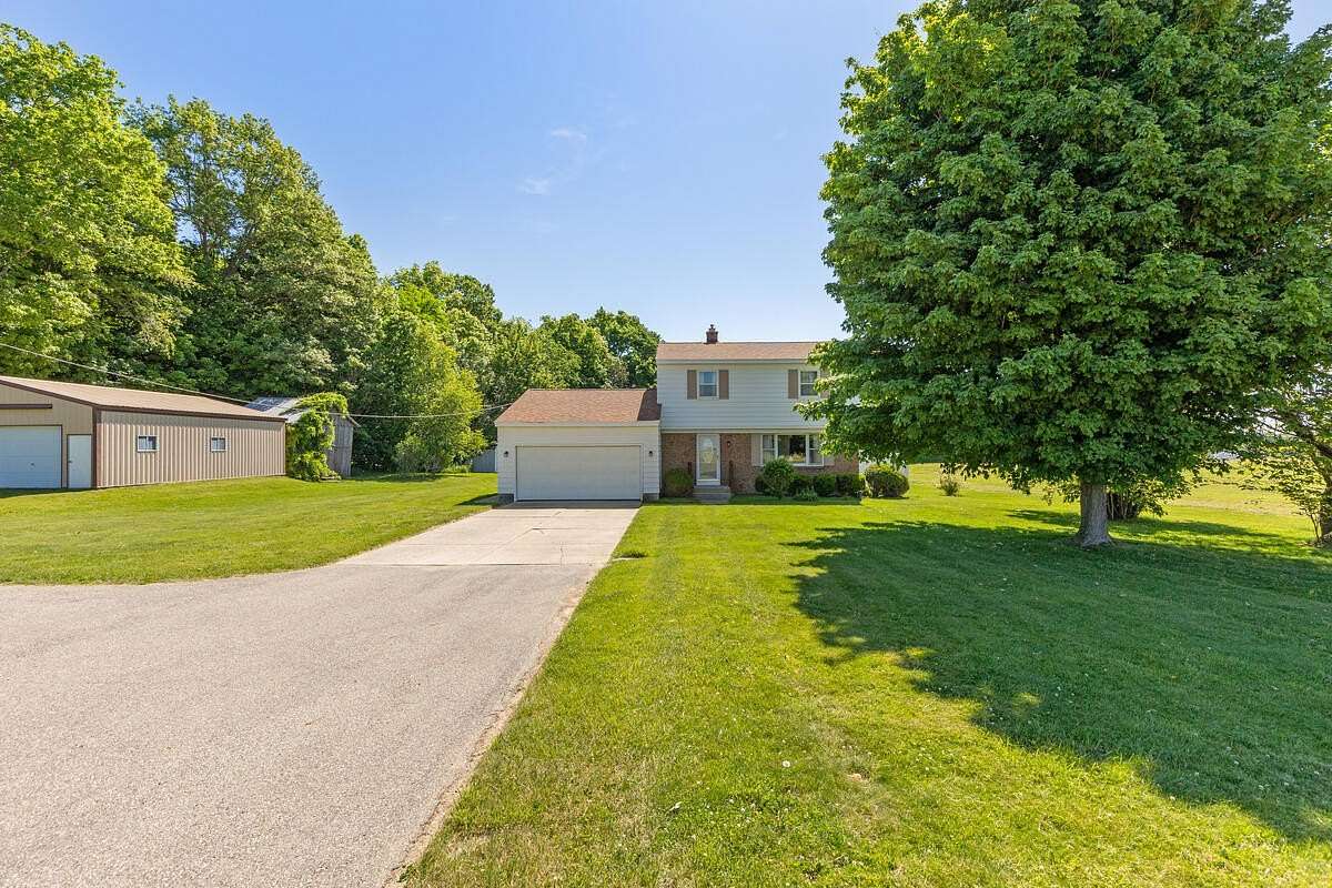 5 Acres of Land with Home for Sale in Hudsonville, Michigan