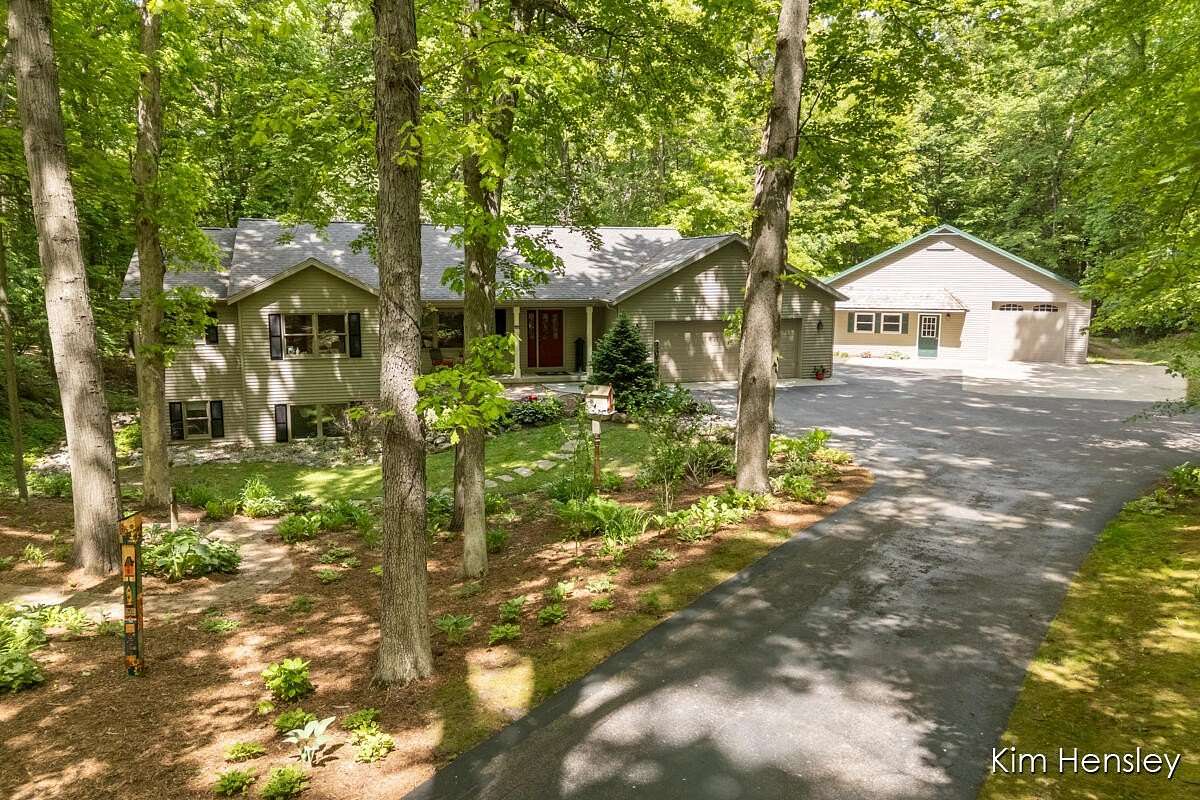 4 Acres of Land with Home for Sale in Rockford, Michigan