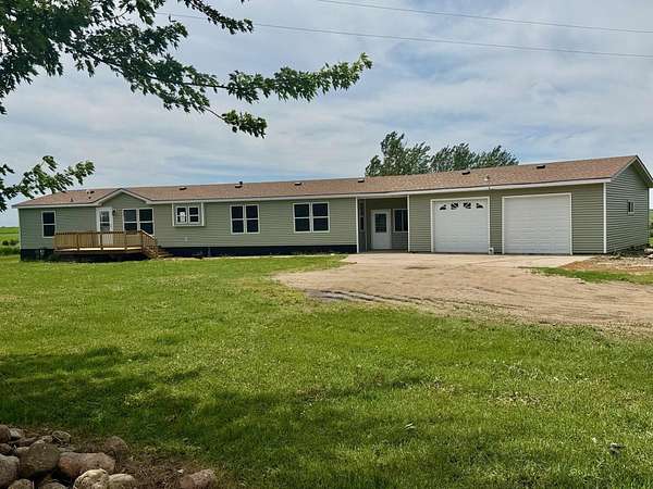 6.8 Acres of Land with Home for Sale in Worthington, Minnesota