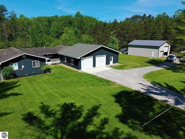 3 Acres of Land with Home for Sale in Lupton, Michigan
