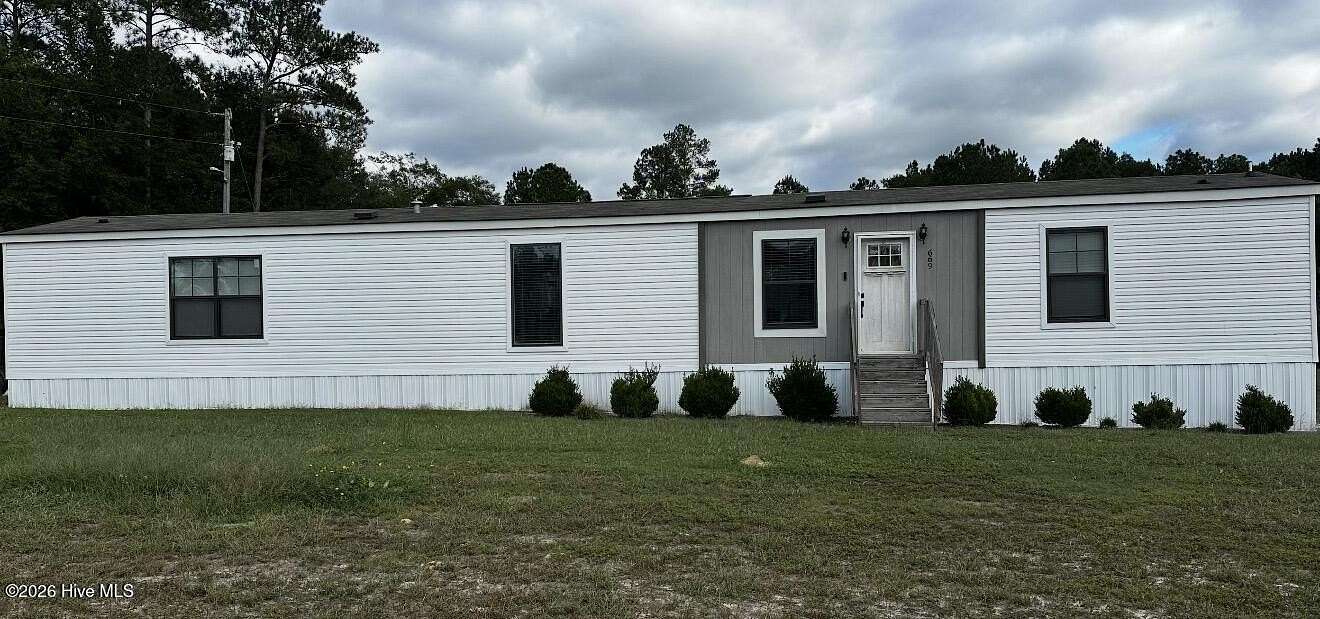 4.56 Acres of Land with Home for Sale in Garland, North Carolina
