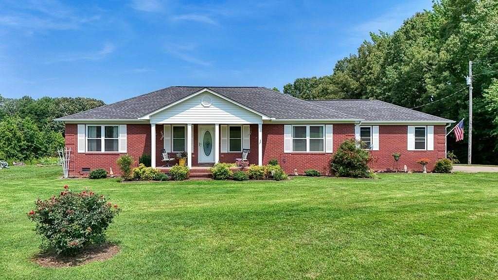 9 Acres of Land with Home for Sale in Buena Vista, Tennessee