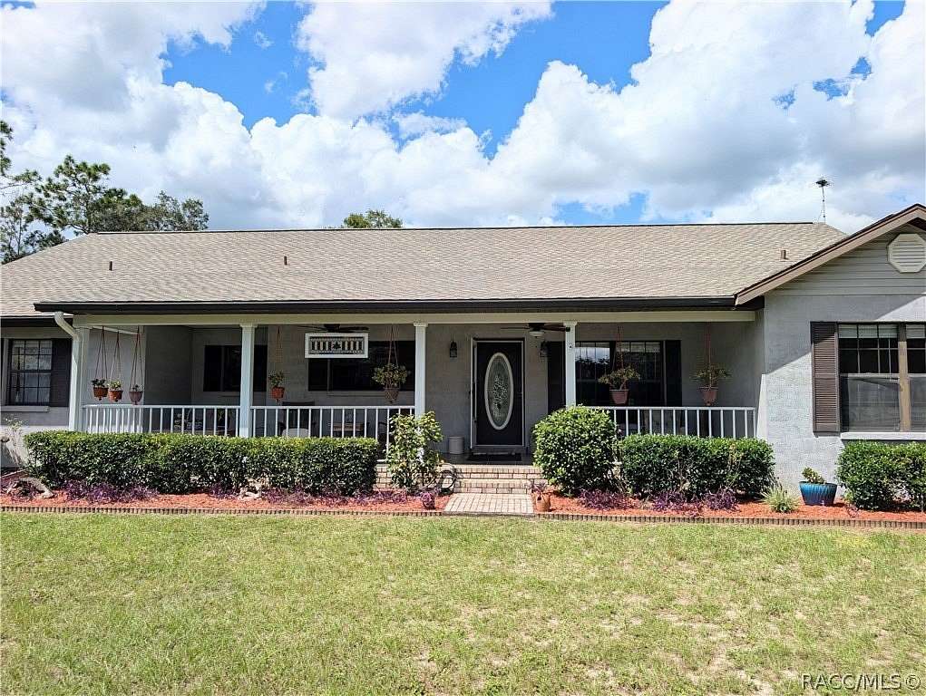 11.3 Acres of Land with Home for Sale in Morriston, Florida