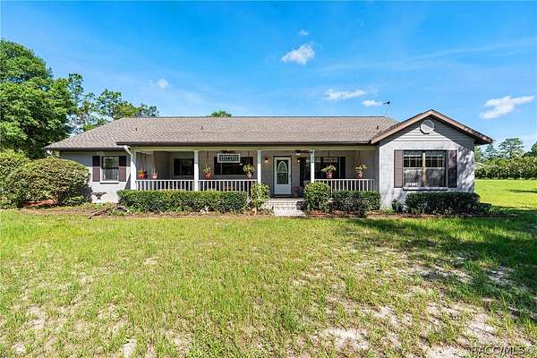 11.3 Acres of Land with Home for Sale in Morriston, Florida