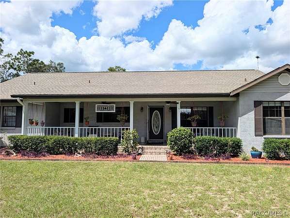 11.3 Acres of Land with Home for Sale in Morriston, Florida