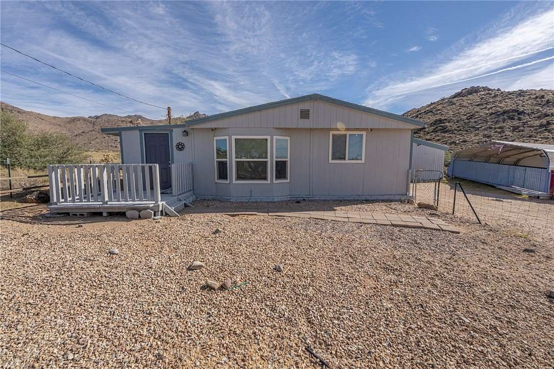 4.85 Acres of Land with Home for Sale in Golden Valley, Arizona