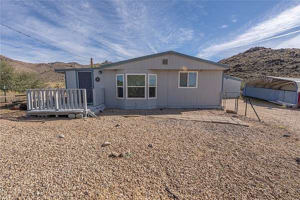 4.85 Acres of Land with Home for Sale in Golden Valley, Arizona