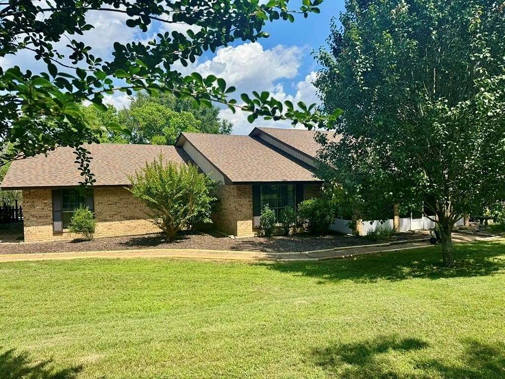 12.8 Acres of Land with Home for Sale in Woodville, Texas