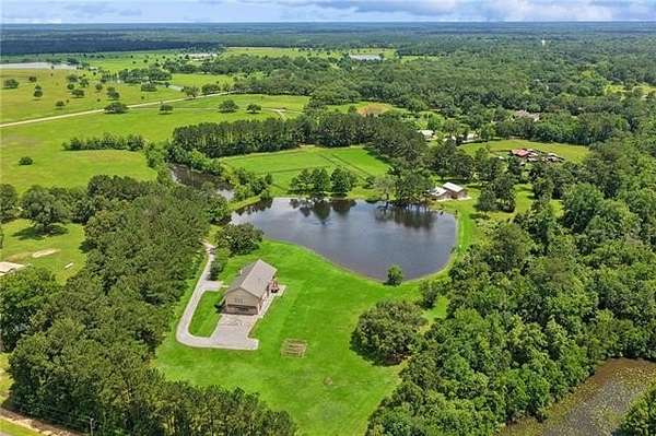 24.2 Acres of Agricultural Land with Home for Sale in Covington, Louisiana