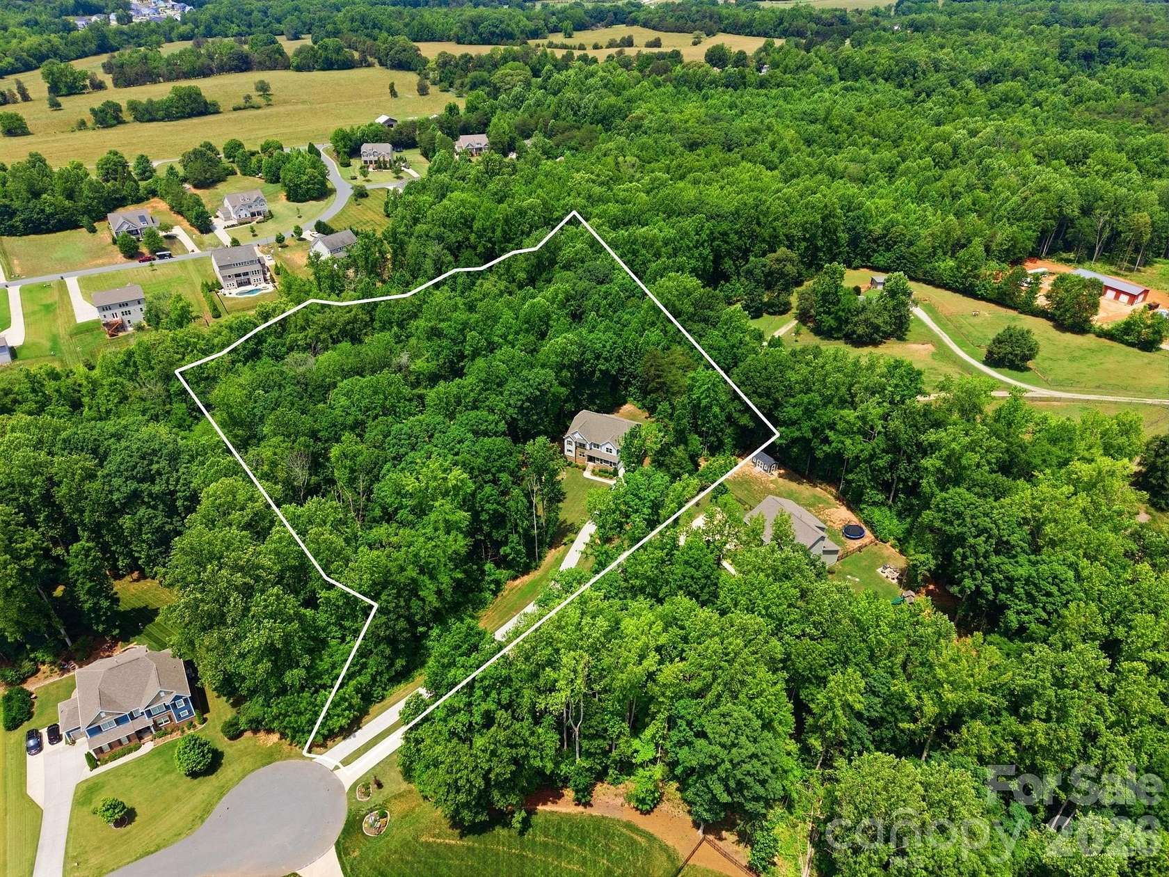 4.32 Acres of Land with Home for Sale in Mooresville, North Carolina