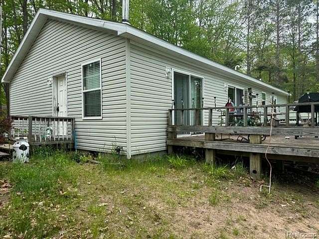 5 Acres of Land with Home for Sale in Edenville Township, Michigan