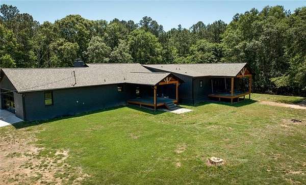 24.7 Acres of Recreational Land with Home for Sale in Auburn, Georgia