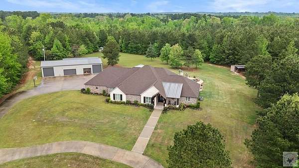 10 Acres of Land with Home for Sale in Atlanta, Texas