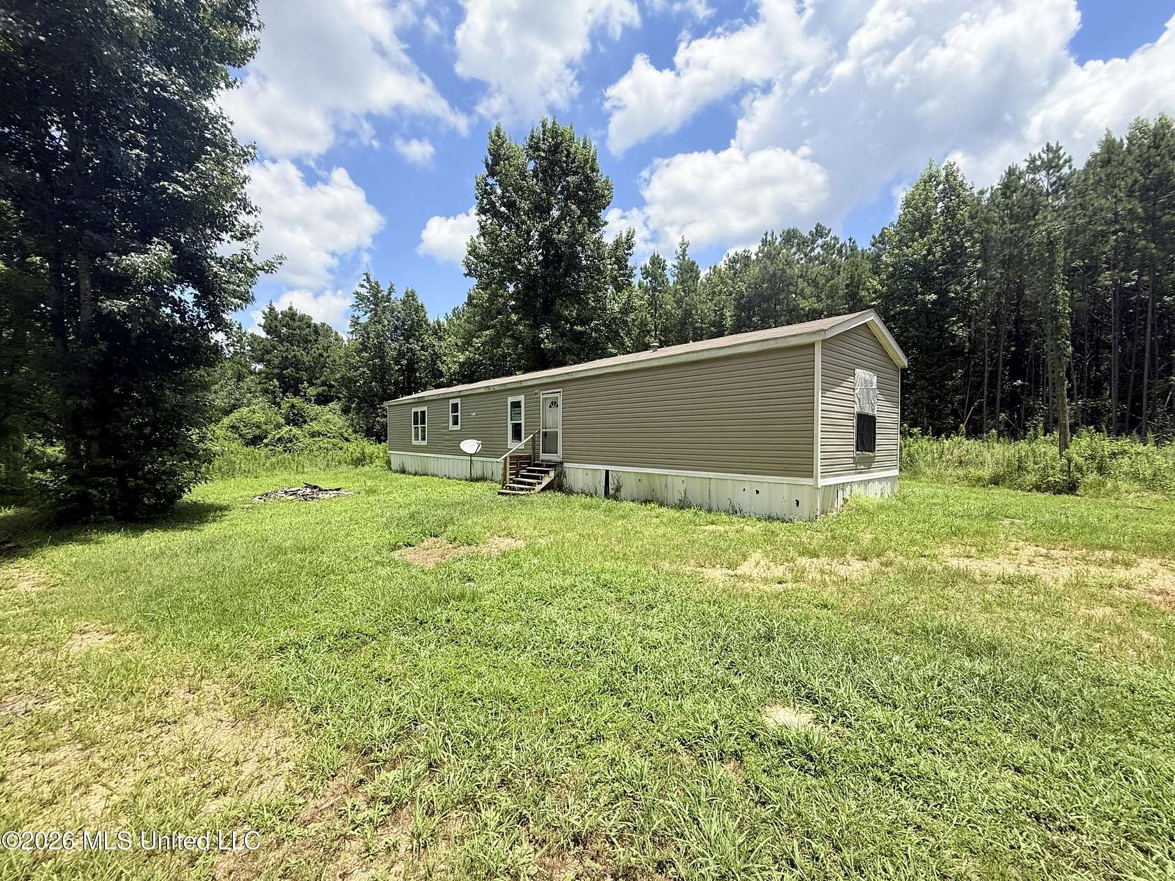 5 Acres of Land with Home for Sale in Prentiss, Mississippi