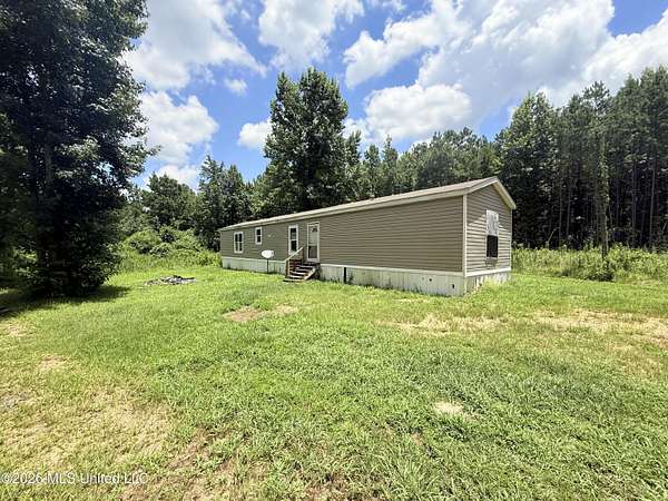 5 Acres of Land with Home for Sale in Prentiss, Mississippi