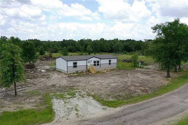 6.32 Acres of Land with Home for Sale in Midway, Texas