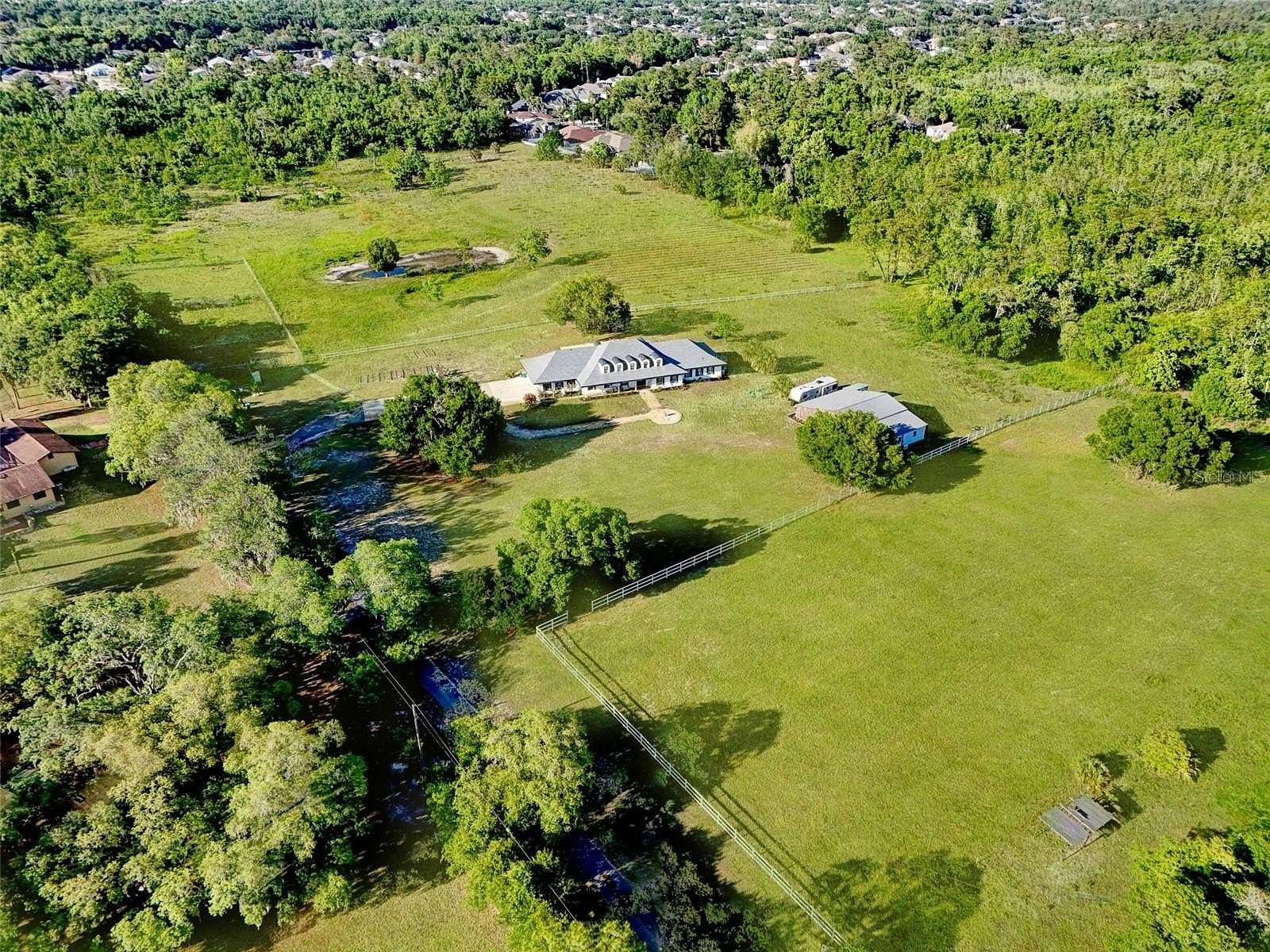 19.7 Acres of Land with Home for Lease in Oviedo, Florida