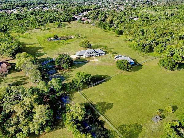 19.7 Acres of Land with Home for Lease in Oviedo, Florida