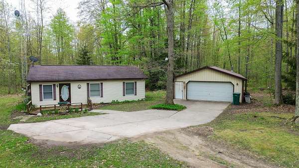 2 Acres of Land with Home for Sale in Harrison, Michigan