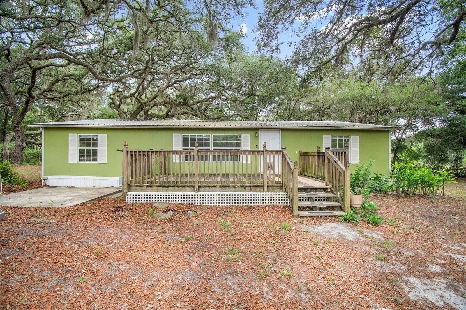 3.59 Acres of Land with Home for Sale in Pomona Park, Florida